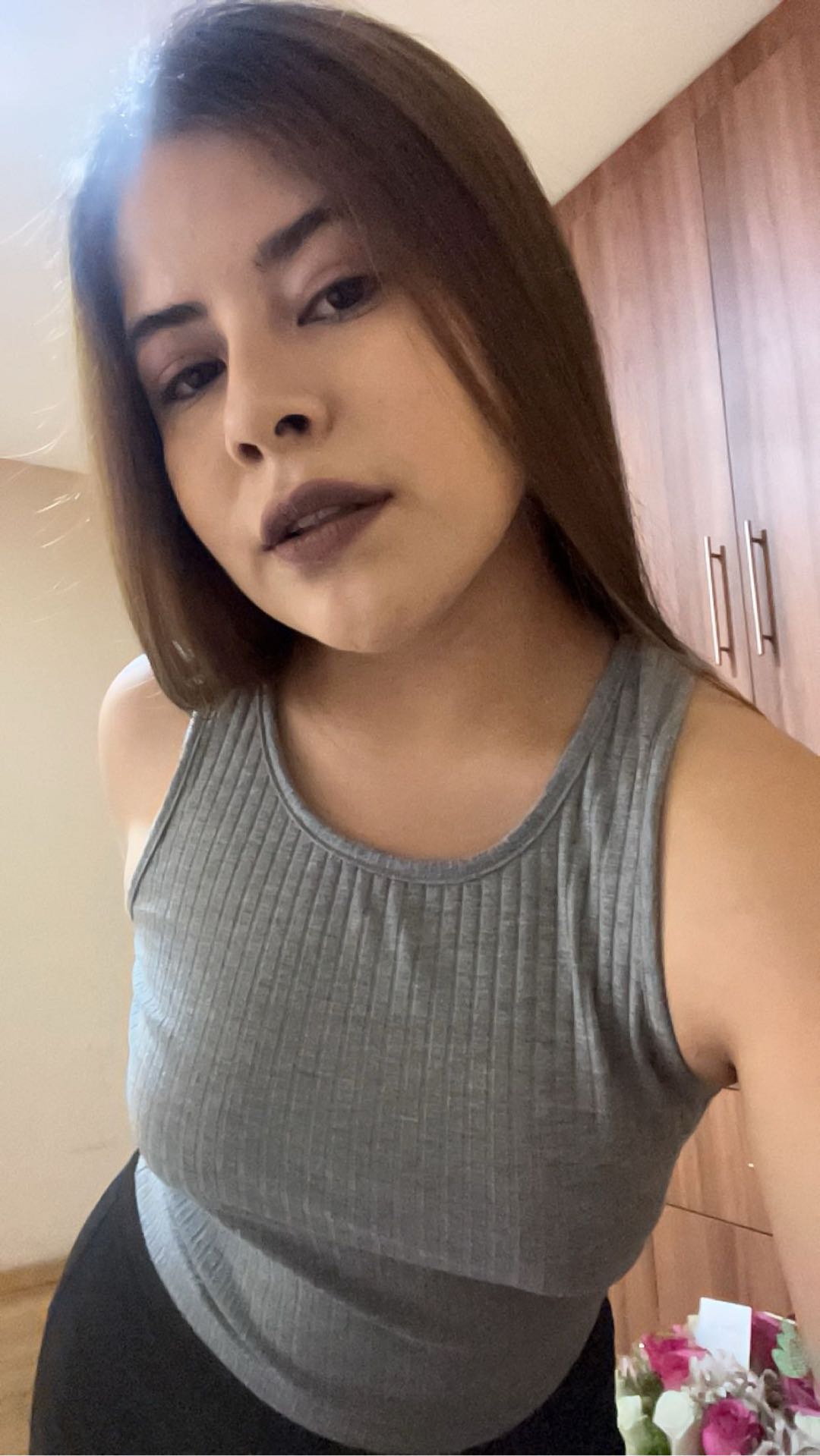 Ludmila from Ecuador, one shuffle away in a random 1-on-1 video chat